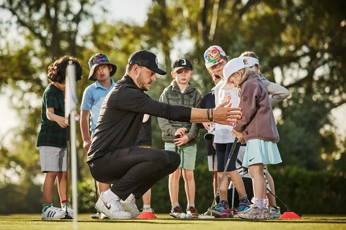 Group coaching session suited to corporate golf events